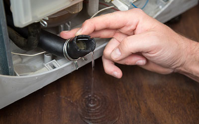 Washing Machine Water Leakage & Drainage Repair